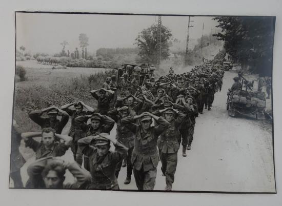 a british ww2 press picture of german prisoners