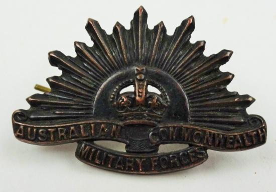 a  ww1/ww2 australian general service badge rising sun