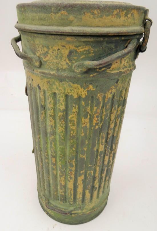 a german ww2 camo gas mask canister