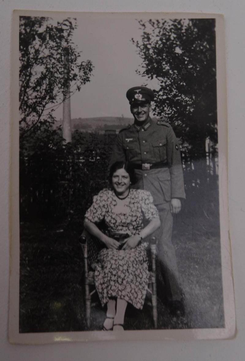 a German ww2 picture of a German soldier and a woman