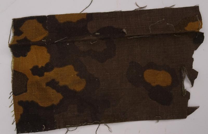 a  piece or fabric from the waffen ss in oak camo