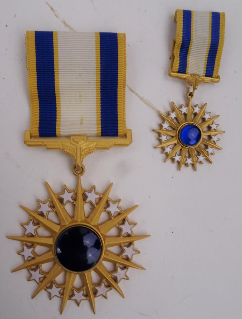 a us Air Force Distinguished Service Medal +miniature