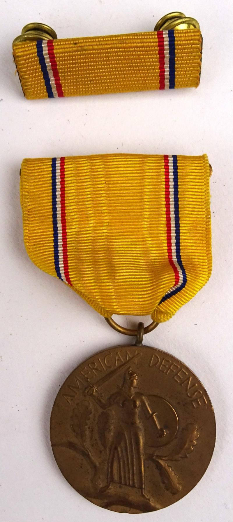 A WW2 US American Defense Medal + ribbon