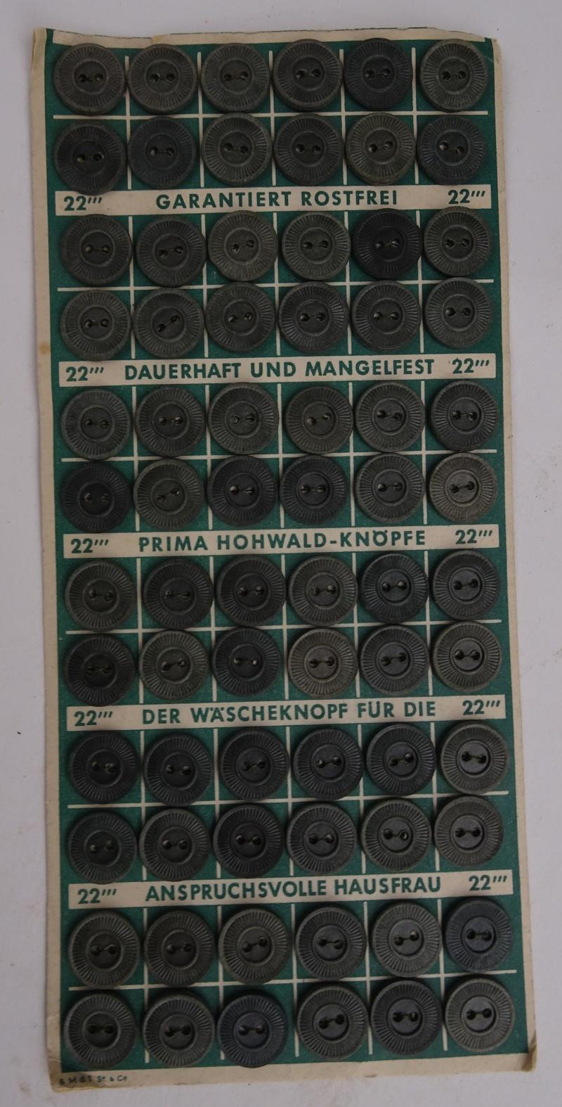 a set with 72  small  buttons on its original cardboard card