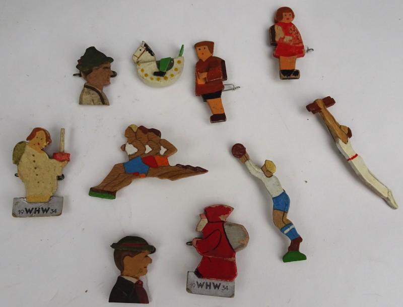 a set of 10 Winterhilfswerk pins