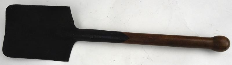 a german ww2 shovel with a marker