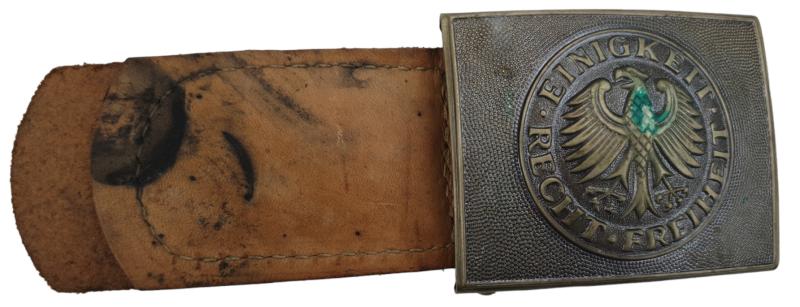 a postwar east german belt buckle
