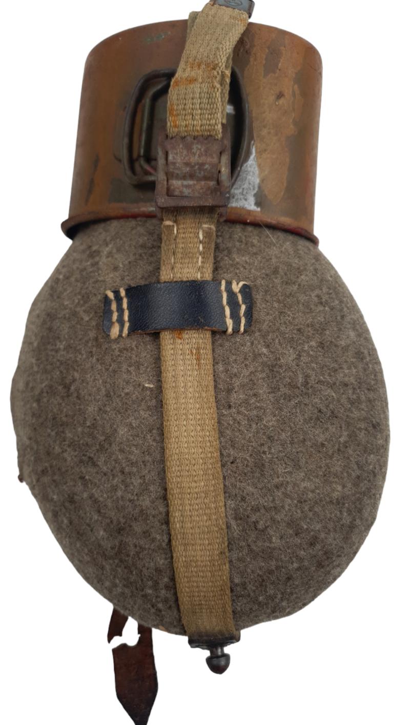 a Wehrmacht M31 Canteen with steel cup