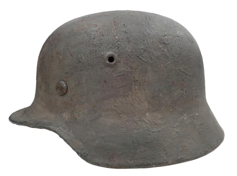 a wehrmacht m40 rough overpainted helmet