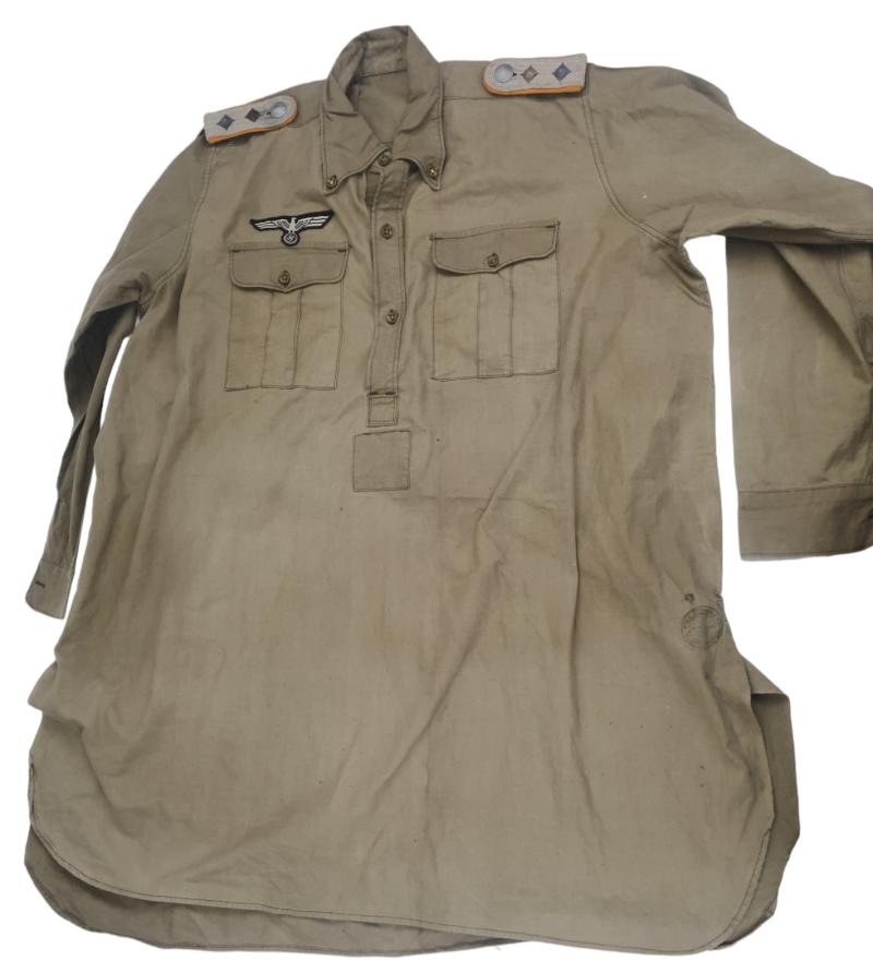 a french made shirt used by the wehrmacht used as war booty with   set off Hauptmann PanzerAufklärung shoulder boards