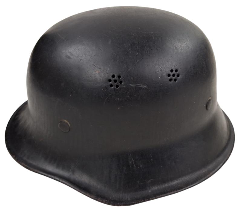 a black WW2 Wehrmacht fire helmet