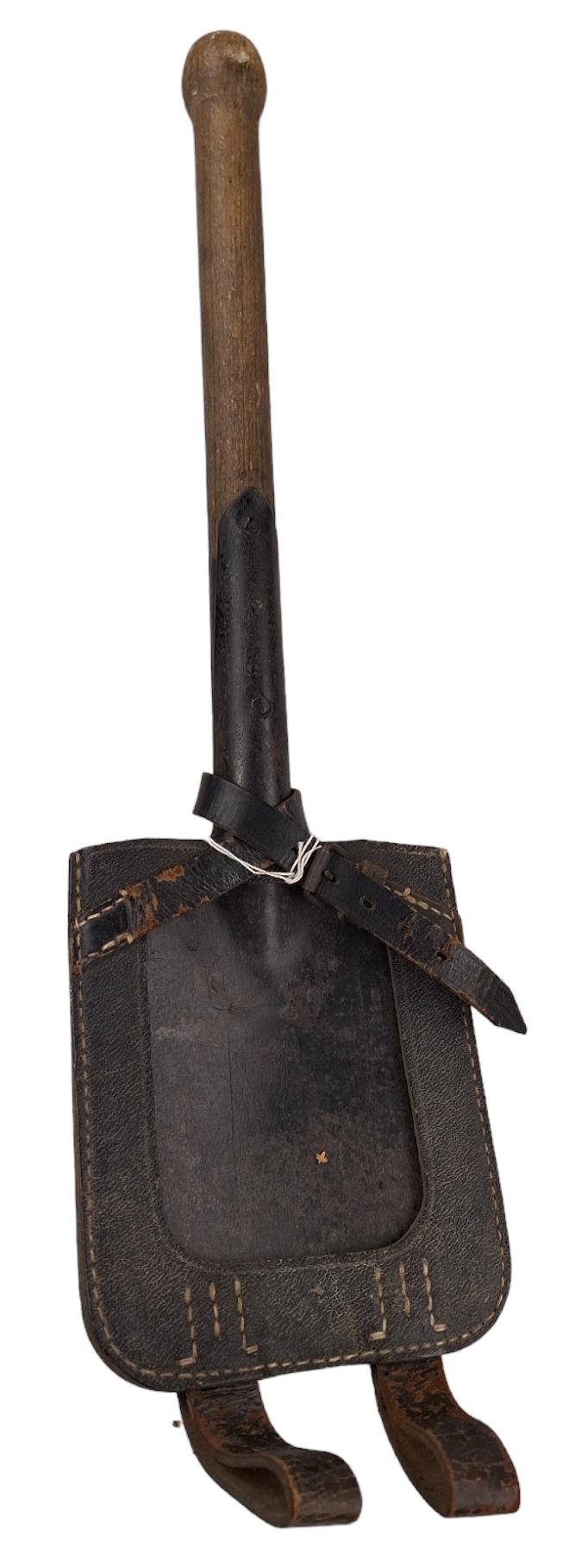 a wehrmacht ww2 shovel with a cover