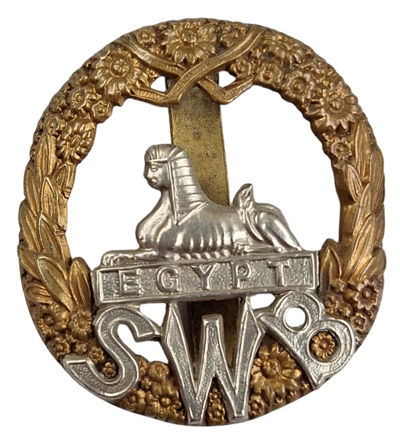 A   british edwardian south wales borderers cap badge
