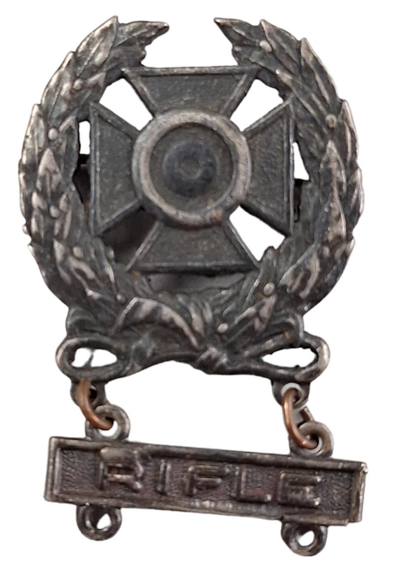 a postwar Rifle Expert Marksman Badge