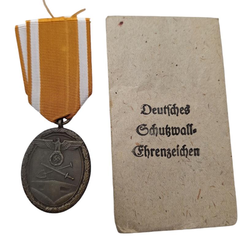 a german  Westwall Medal with Pouch