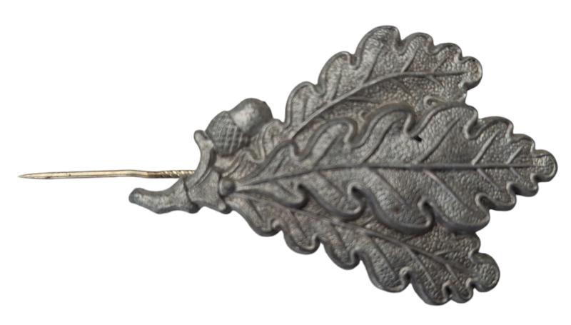 a german ww2 jager metal cap badge