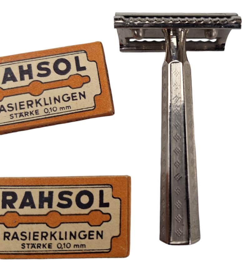 a german rasor with 2 packages off blades
