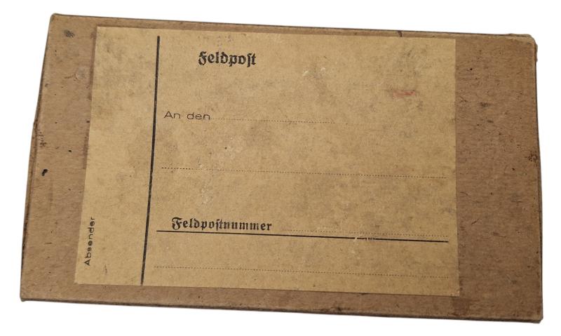 Whermacht carton fieldpost box with some kind of marbles in it