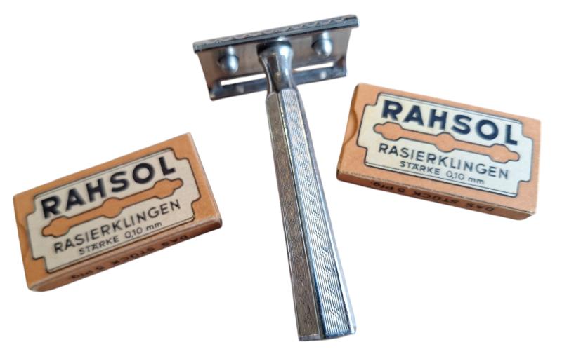 a german rasor with 2 packages off blades