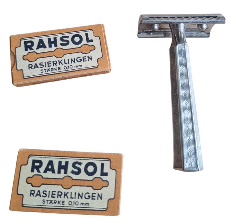 a german rasor with 2 packages off blades
