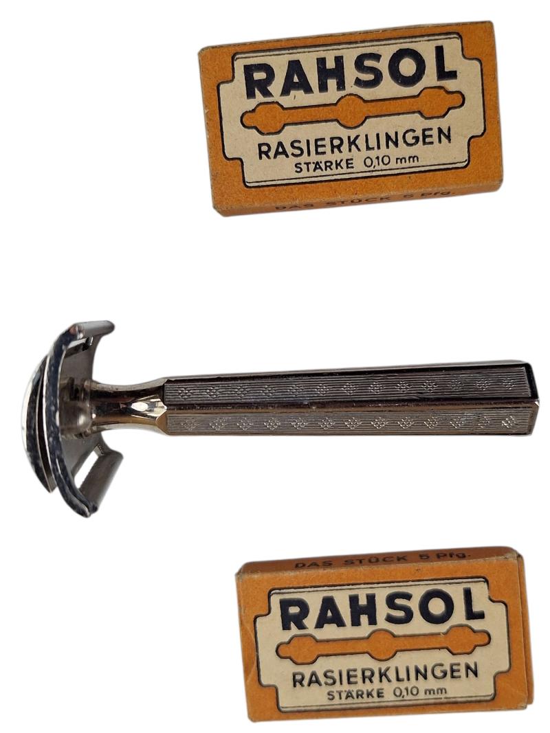 a german rasor with 2 packages off blades