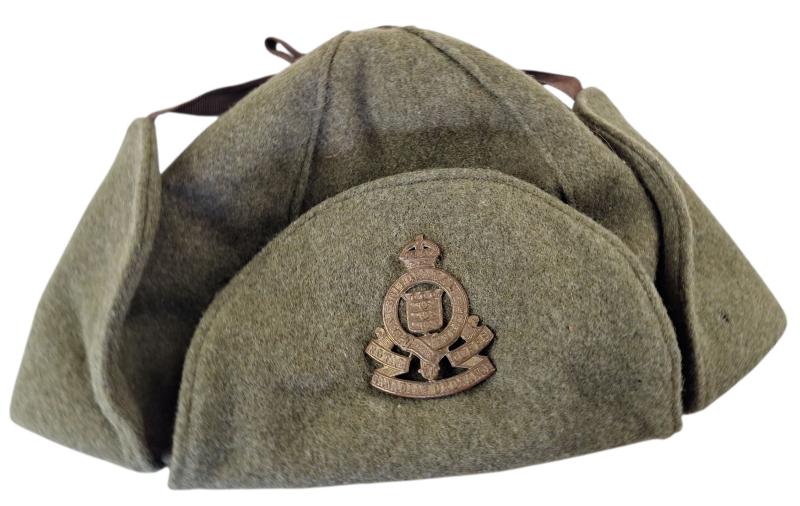 a Canadian 1942 cap with  Royal Canadian Ordnance Corps badge
