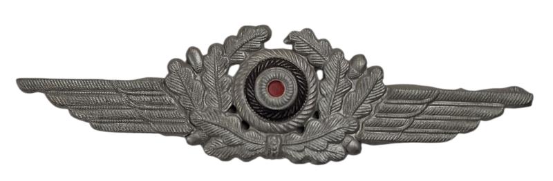 a german schirmmutze cockarde