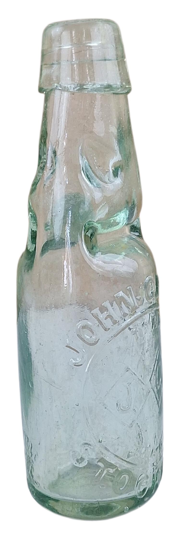a vintage emty bottle of JG John Grundy Stockport E BREFFIT & Co. 'codd'