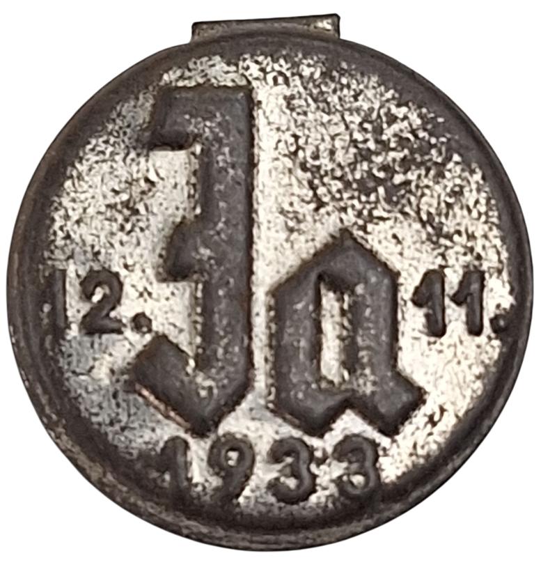 A german pro-hitler propaganda 1933 badge