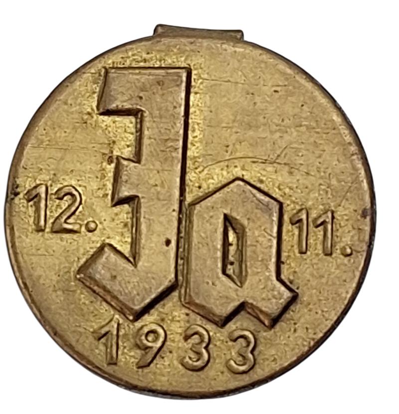 A german pro-hitler propaganda 1933 badge