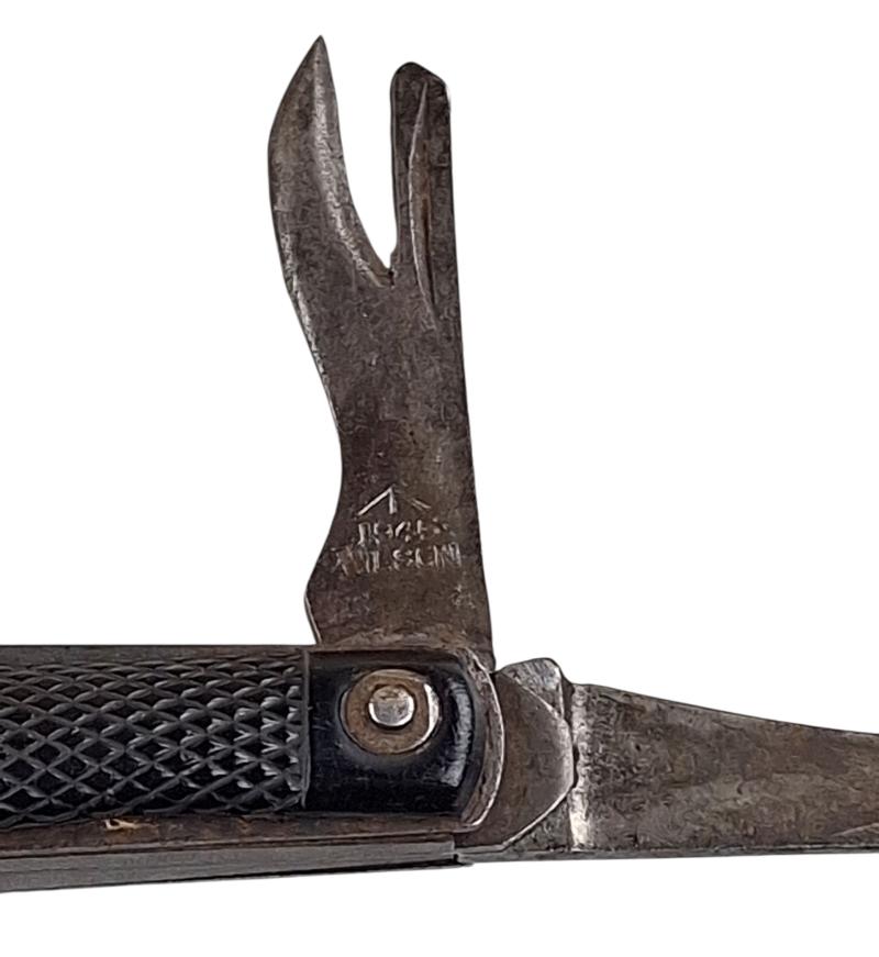 A british ww2 pocket knife with its original string