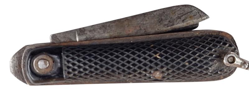 A british ww2 pocket knife with its original string