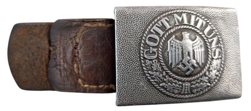 a Wehrmacht belt buckle with tab