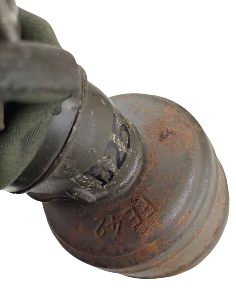 a tall m38 gasmask with original carrying strap