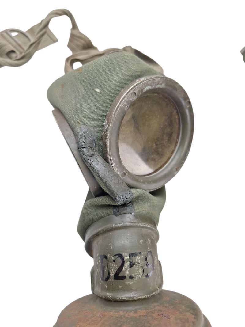 a tall m38 gasmask with original carrying strap