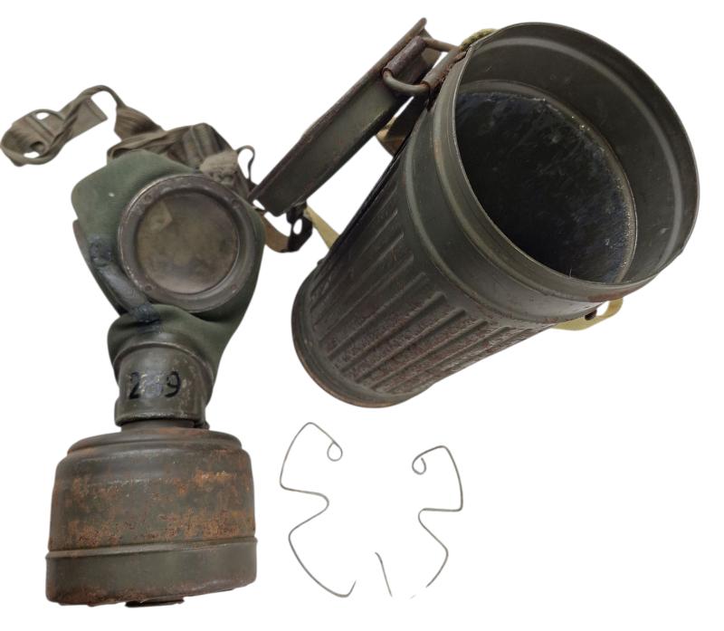 a tall m38 gasmask with original carrying strap