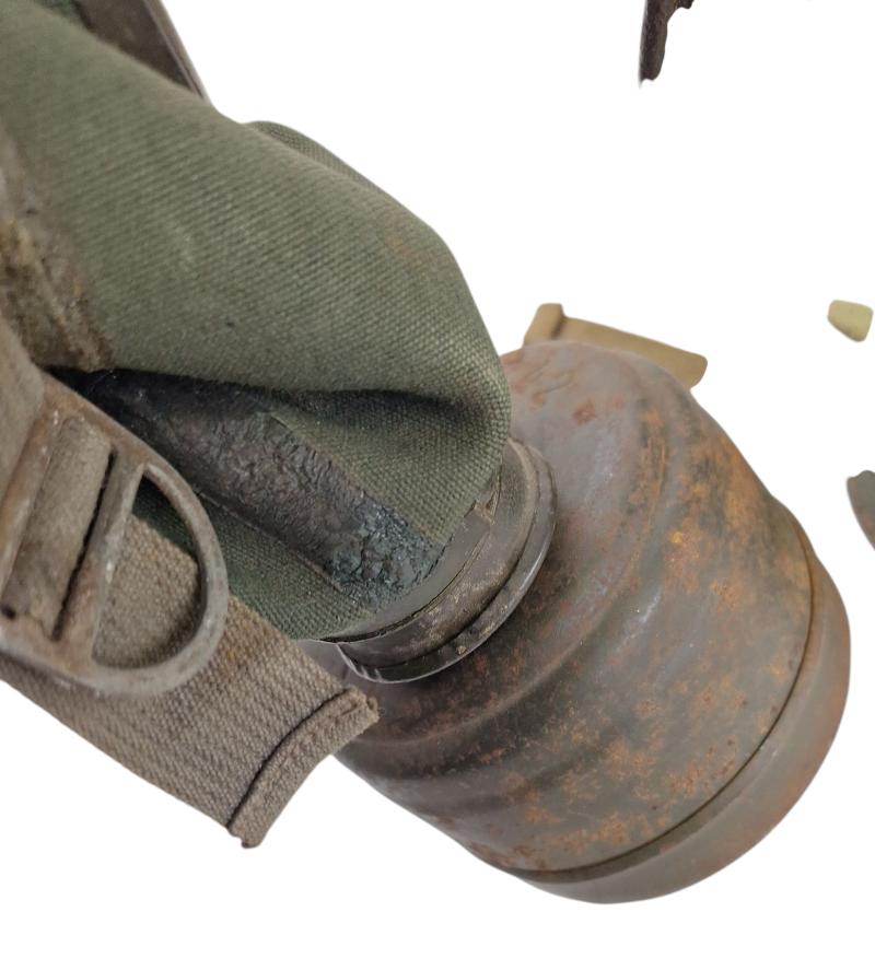 a tall m38 gasmask with original carrying strap
