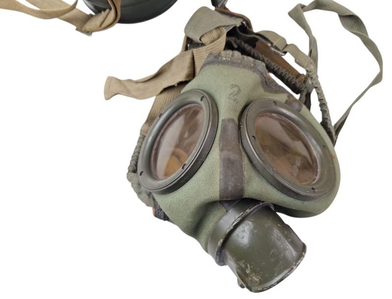 a small m38 gasmask with original carrying strap