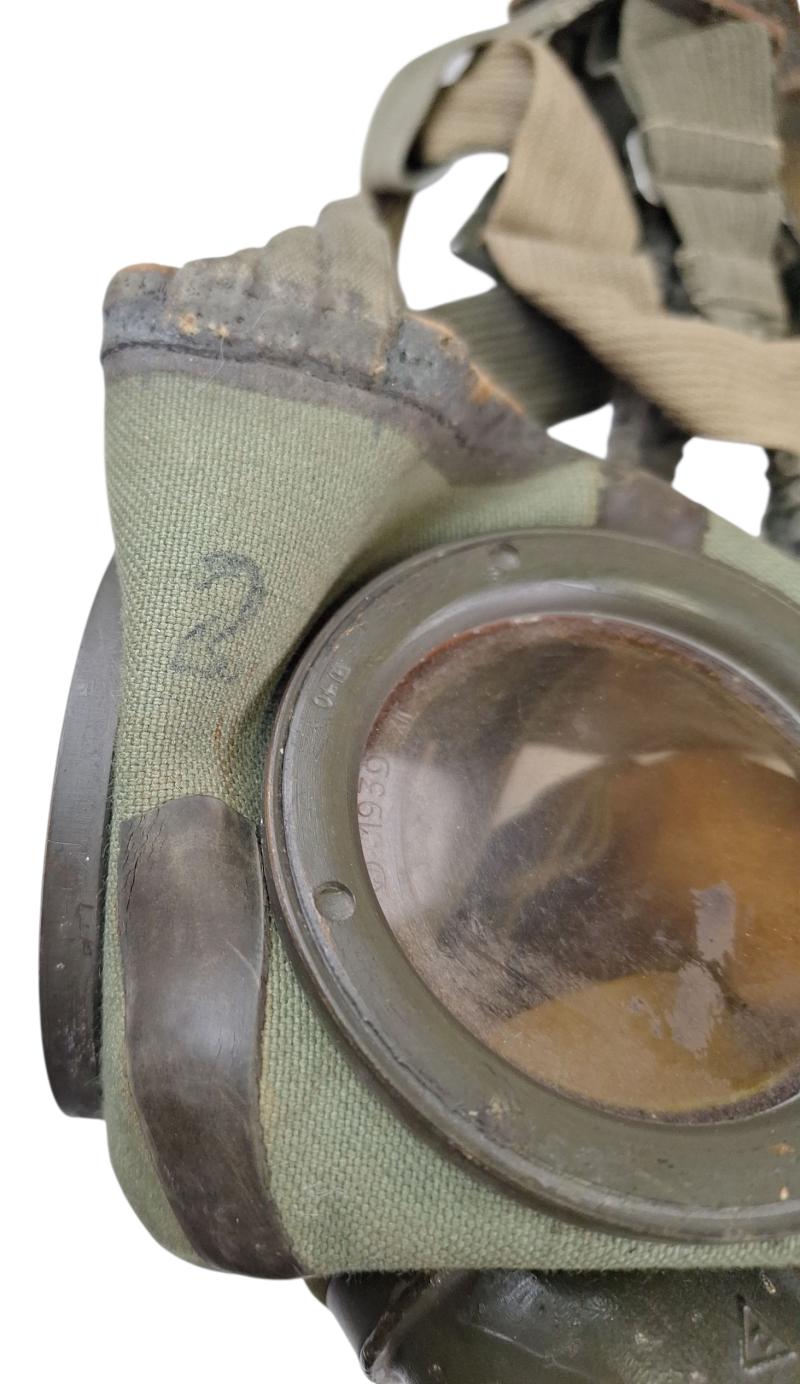a small m38 gasmask with original carrying strap