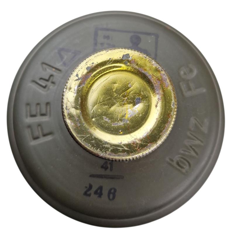 a small m38 gasmask with original carrying strap