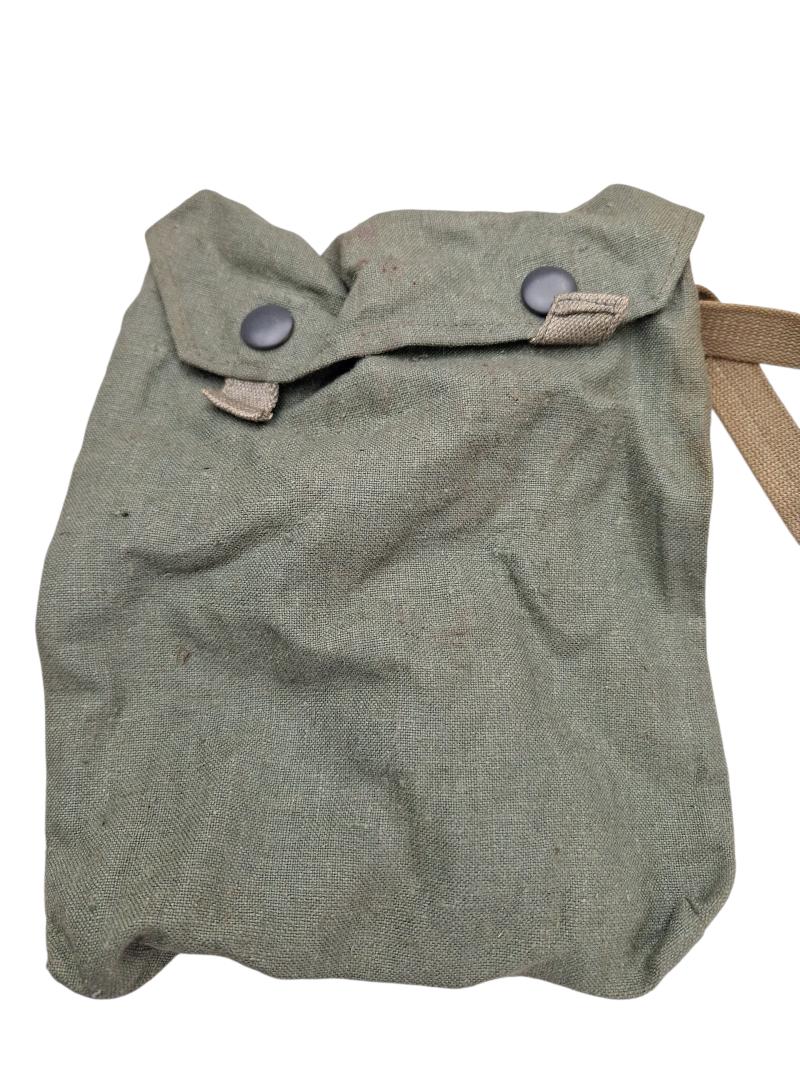 a small m38 gasmask with original carrying strap