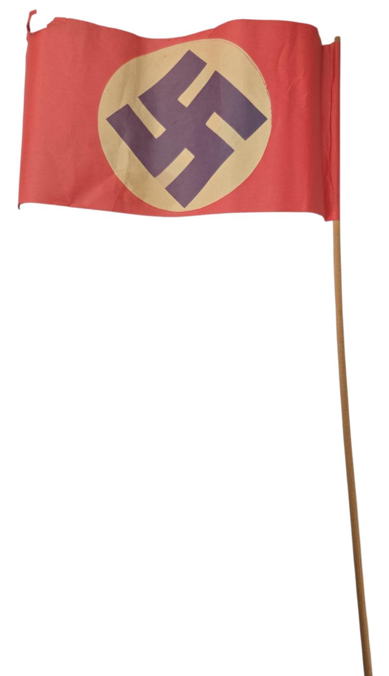 German swastika paper flag on a wooden stick
