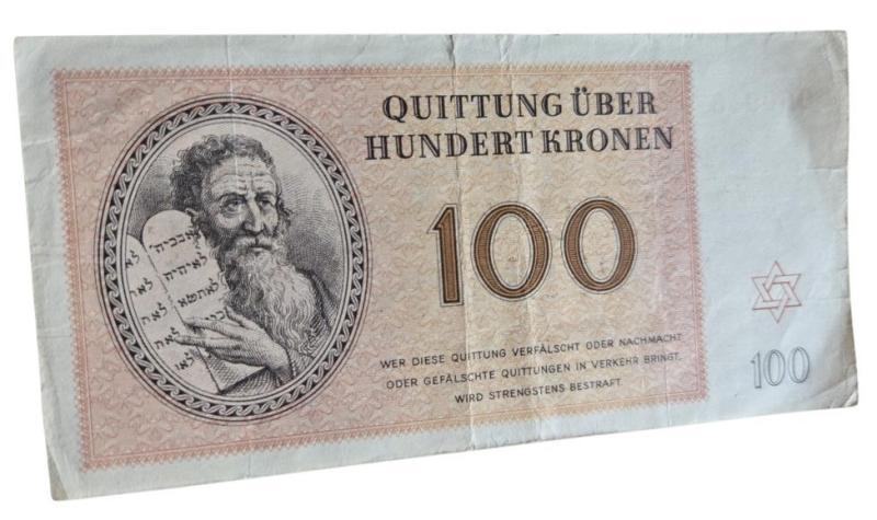 A rare   100 kronen scrip note issued in the Theresienstadt Ghetto, dated January 1, 1943.