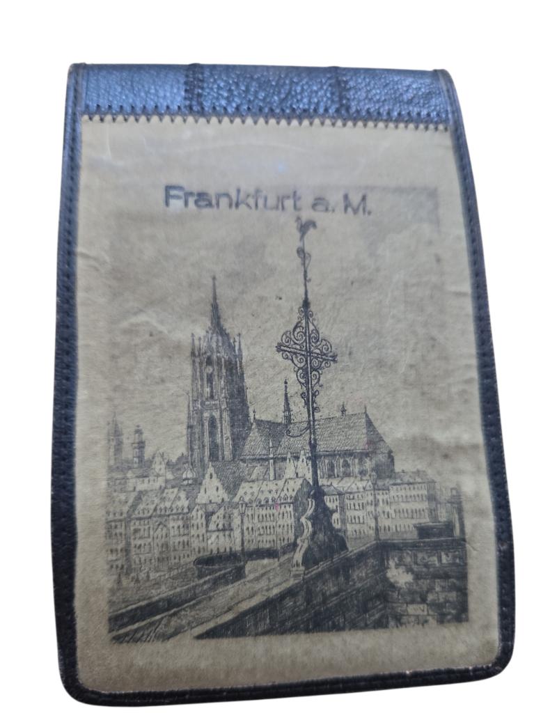 A small private photo album with 11 photos from WWII.