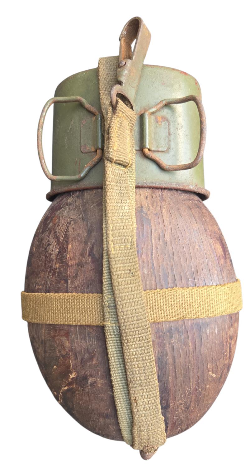 a pressed wood M31 Canteen and Cup