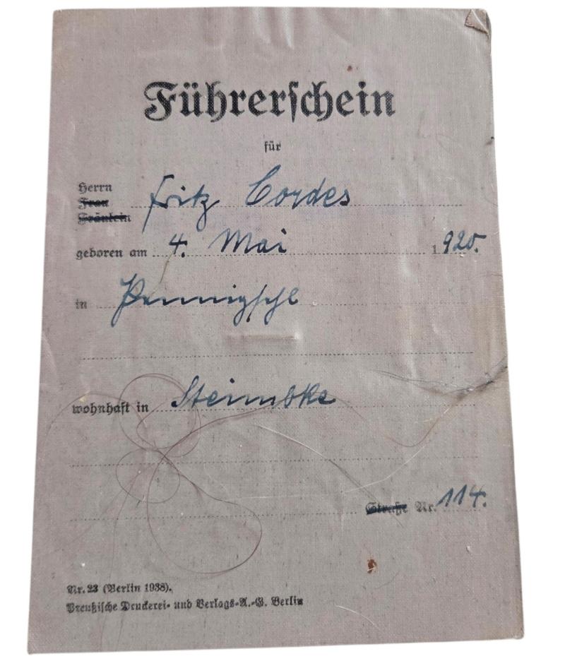 A German WWII-era driving licence in the name of Fritz Cordes, in used condition.