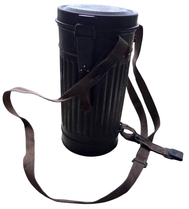 a small m38 gasmask with original carrying strap